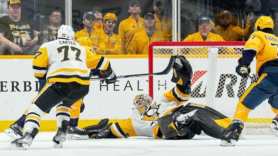 Freeze Frame: Jarry stones Granlund ... twice! taken in Nashville, Tenn. (Penguins)